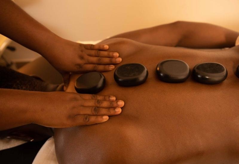 Hot stone massage with heated basalt stones in Kondapur, Hyderabad