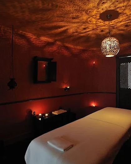 Private treatment room with massage table at V3 Wellness Spa, Kondapur
